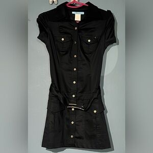Fit to body, over the knee with small gold buttons on sleeves, the front & back.